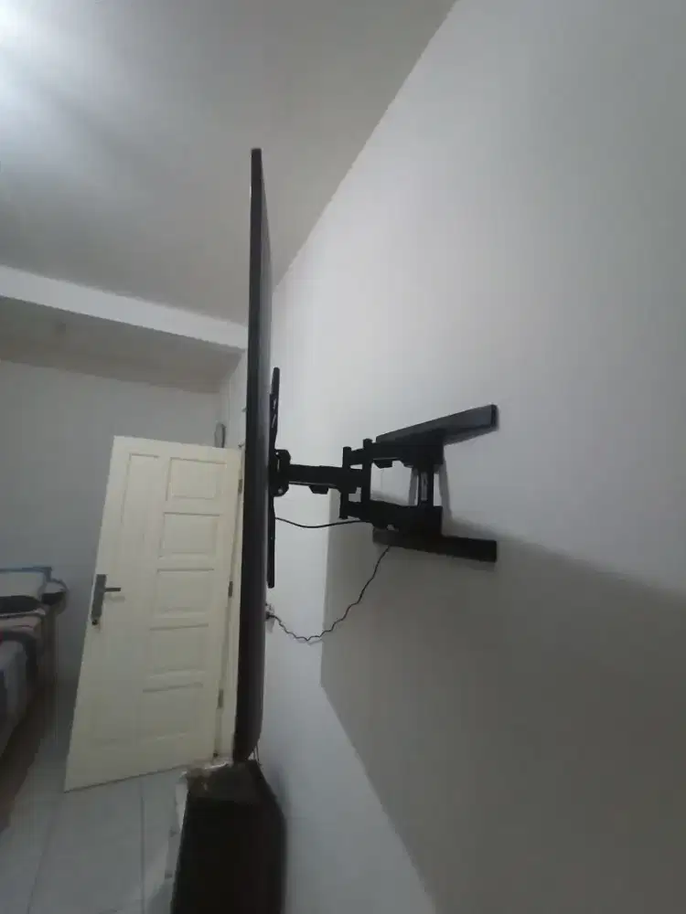 Jual bracket tv plus pemasangan di dinding