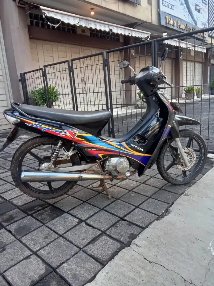 Honda supra x 100 tahun 2004