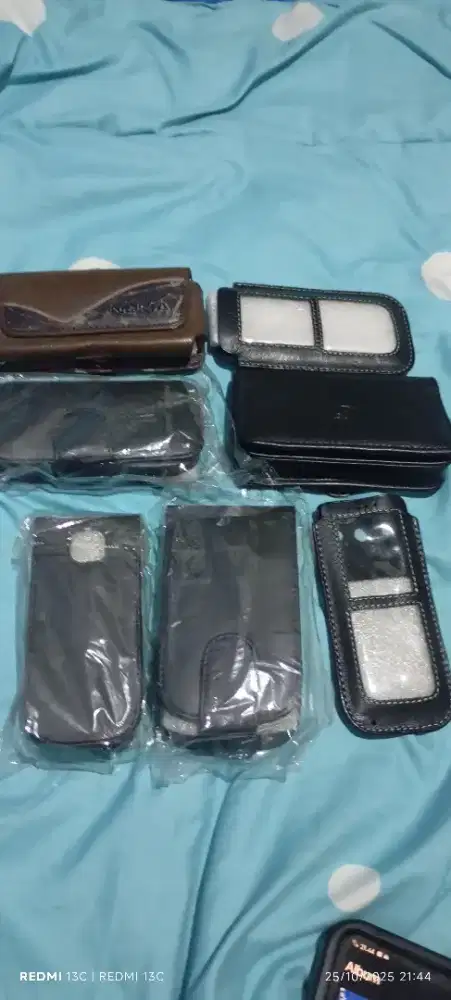 Jual sarung atau dompet hp dan lain nya kondisi baru stok lama