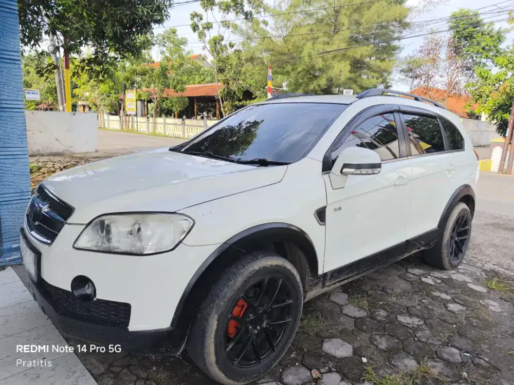 Captiva bensin 2.4 Lt warna putih terawat