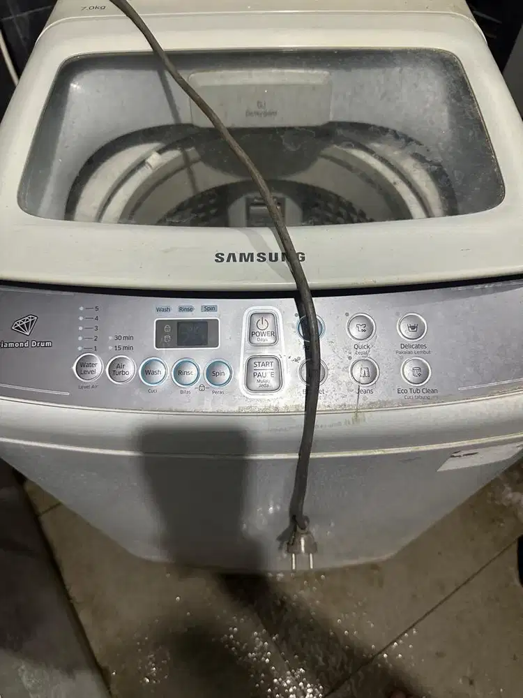 Mesin Cuci Rusak