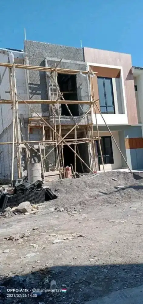 Tukang bangunan harian/borongan