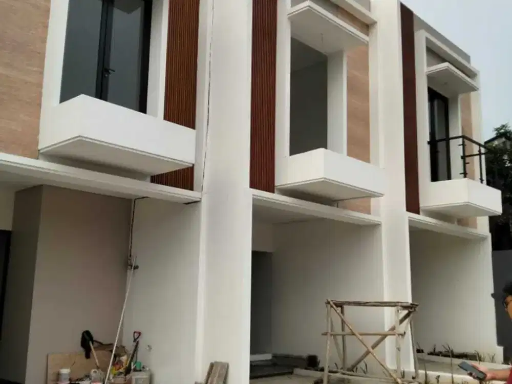 Rumah siap huni pinggir jalan raya pengasinan Depok dalam cluster