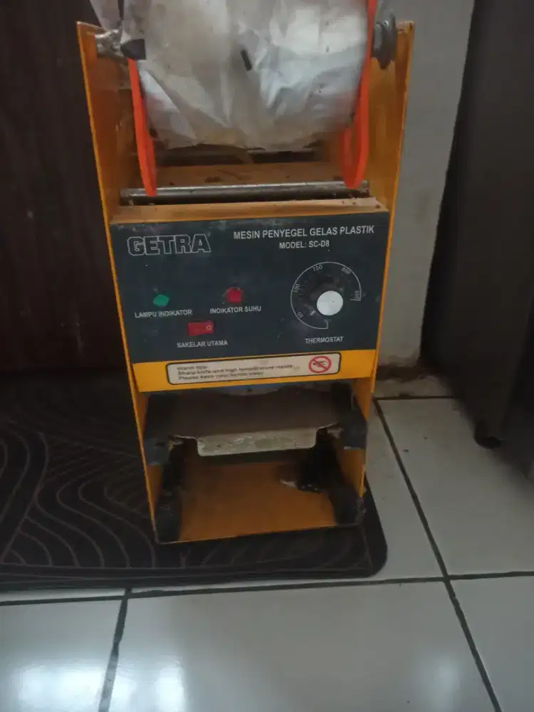 Mesin sealer cup manual merk getra second
