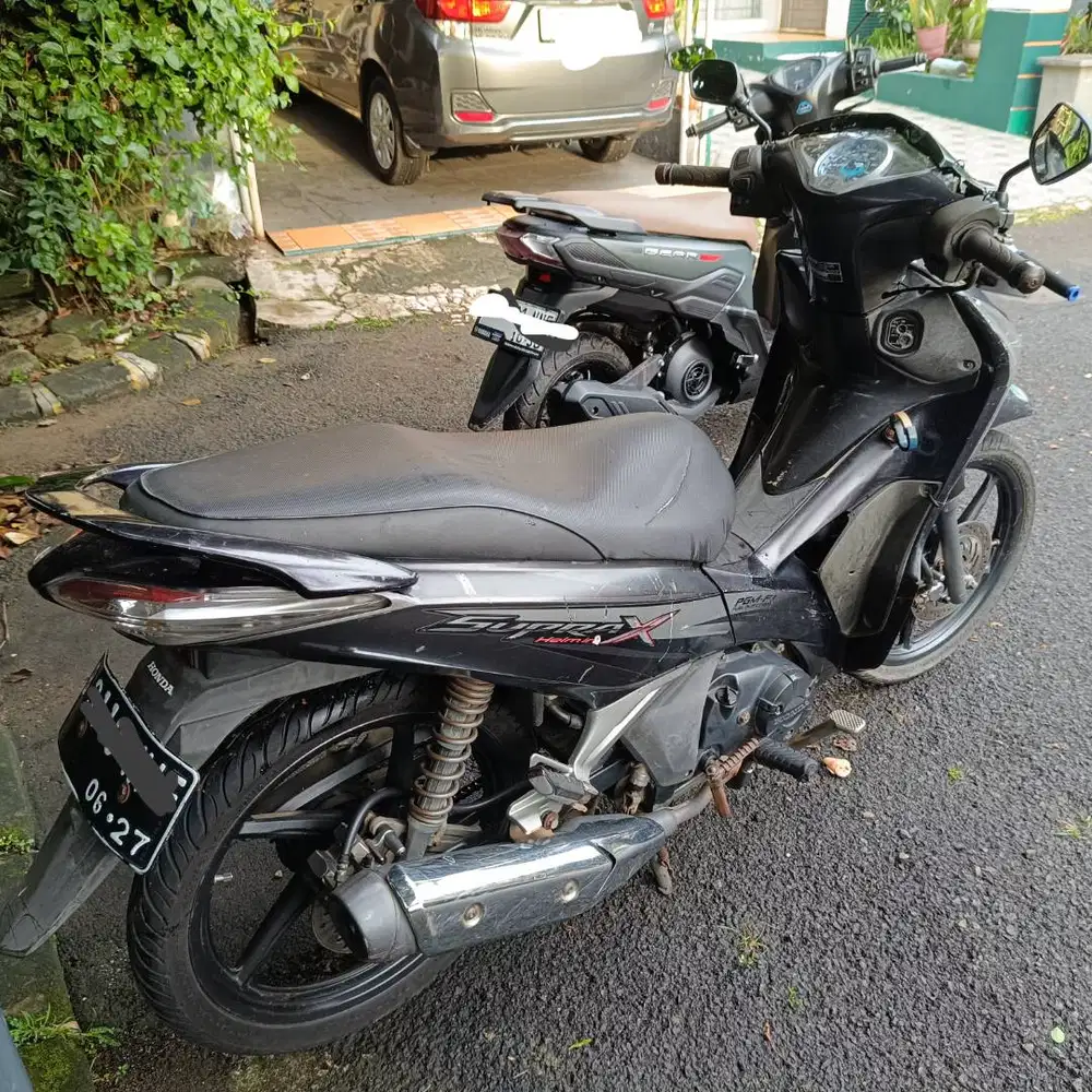 Supra X 125 Helm In PGM FI