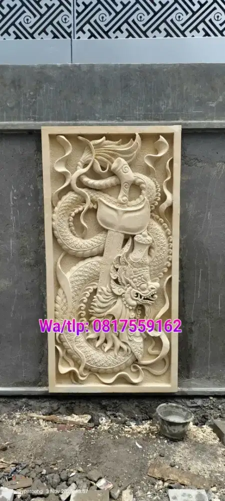 Ornamaen  naga jawa batu paras jogja
