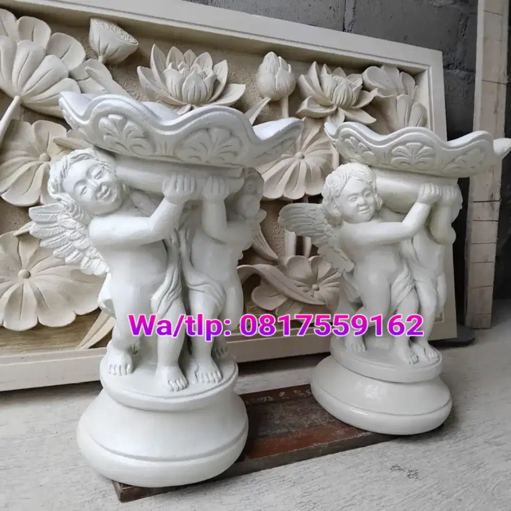 Patung malaikat batu paras