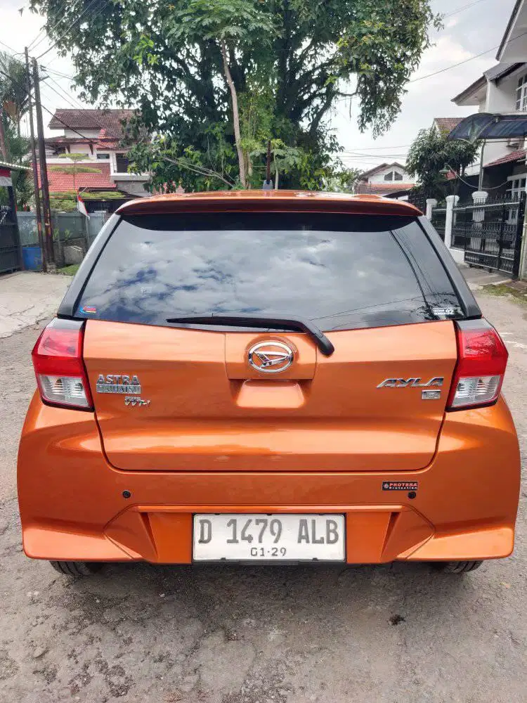 DAIHATSU AYLA  R 1.2 MT 2024 ORANYE KM RENDAH 8RBU ORIGINAL
