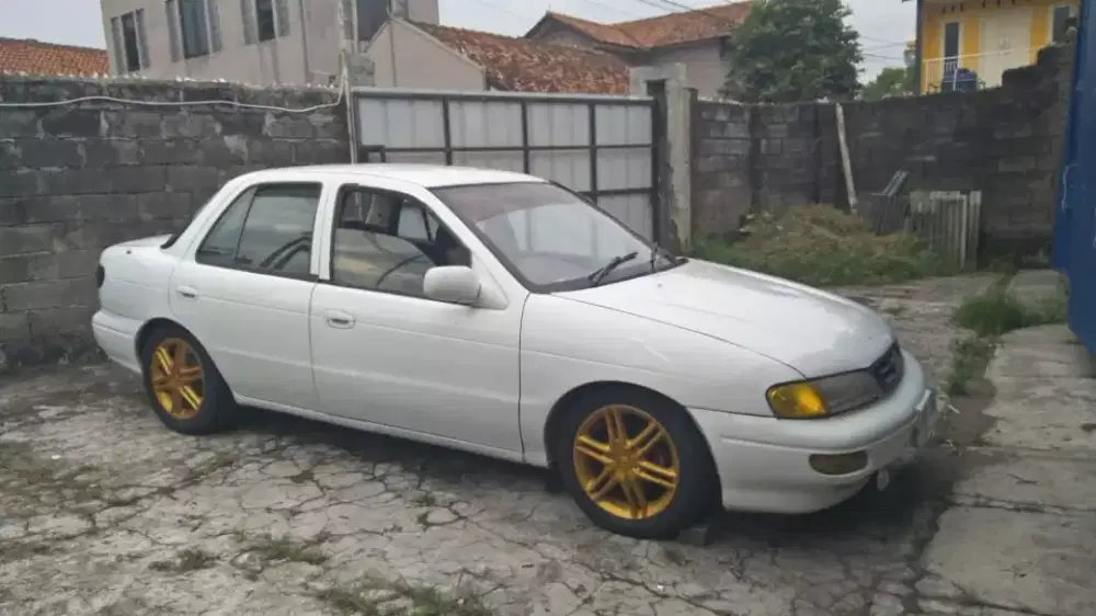 Timor Dohc s515i putih 1999 joss