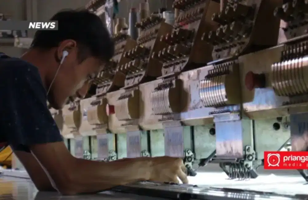 Tukang bordir berpengalaman