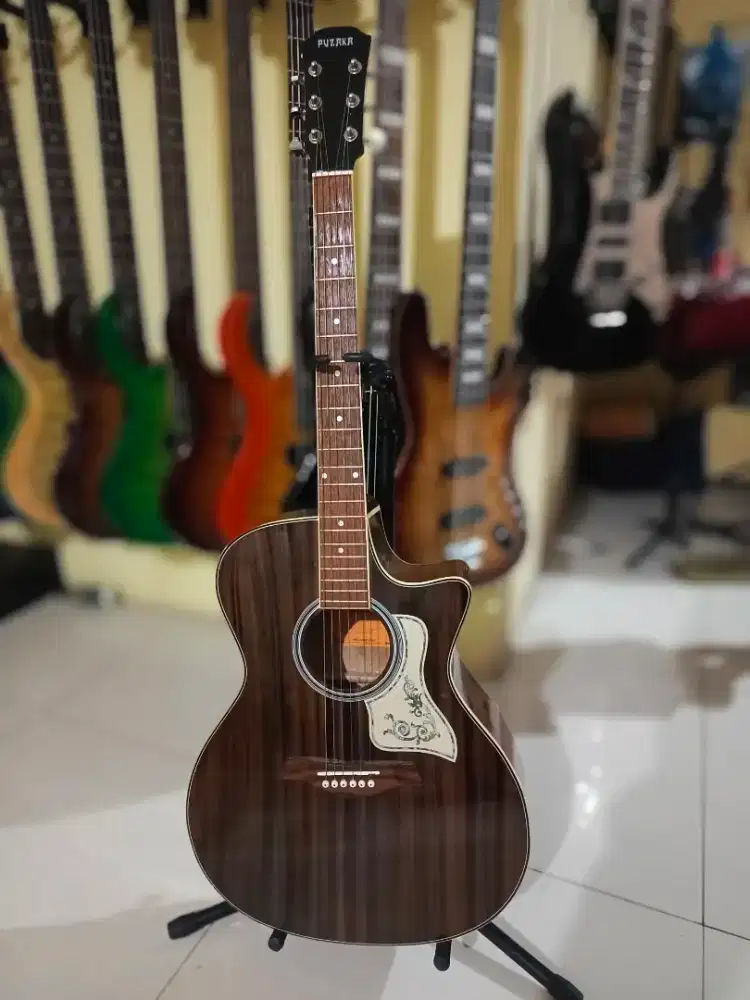 Gitar akustik merk puzaka