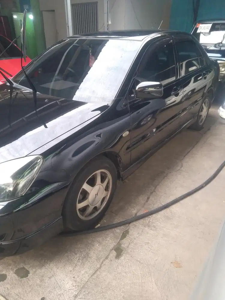 Mitsubishi Lancer 2011 Bensin