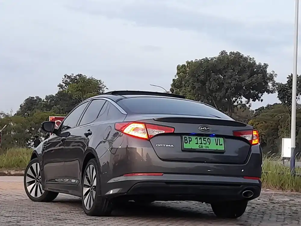 KIA OPTIMA AUTOMETIC PAJAK HIDUP STNK BPKB LENGKAP TANGAN PERTAMA