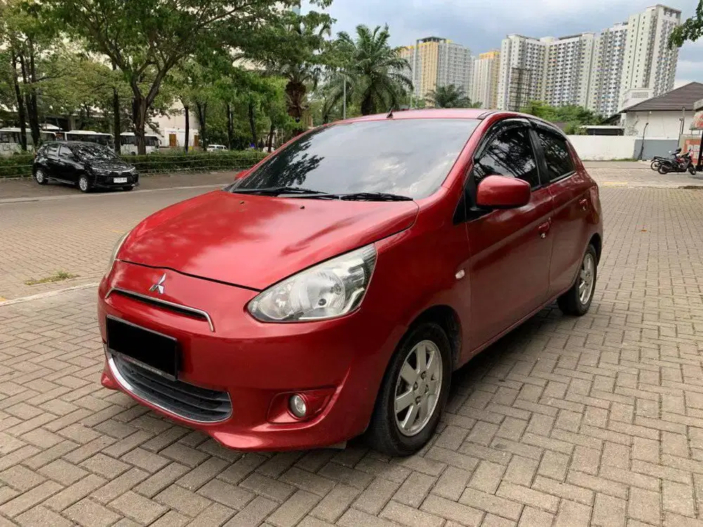 MITSUBISHI MIRAGE 1.2 EXCEED AT 2014 MERAH PROMO DP 2 JUTA