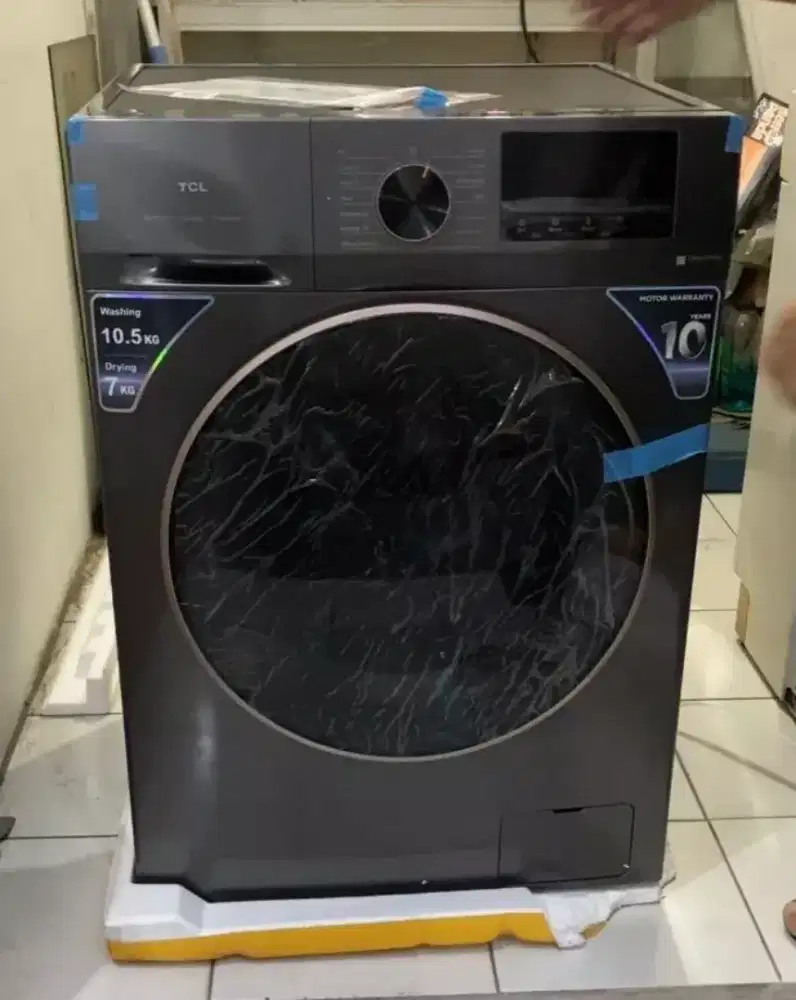 Mesin cuci TCL front loading kapasitas  10,5kg