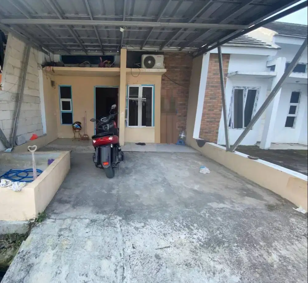 Jual Rumah di Grand PGRI Residence siap huni lokasi setrategis (C0902)