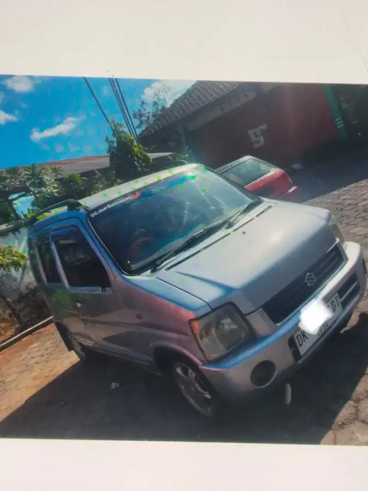 Jual cepat Mobil Zusuki karimun warna Silver THN 2003 siap pakai.