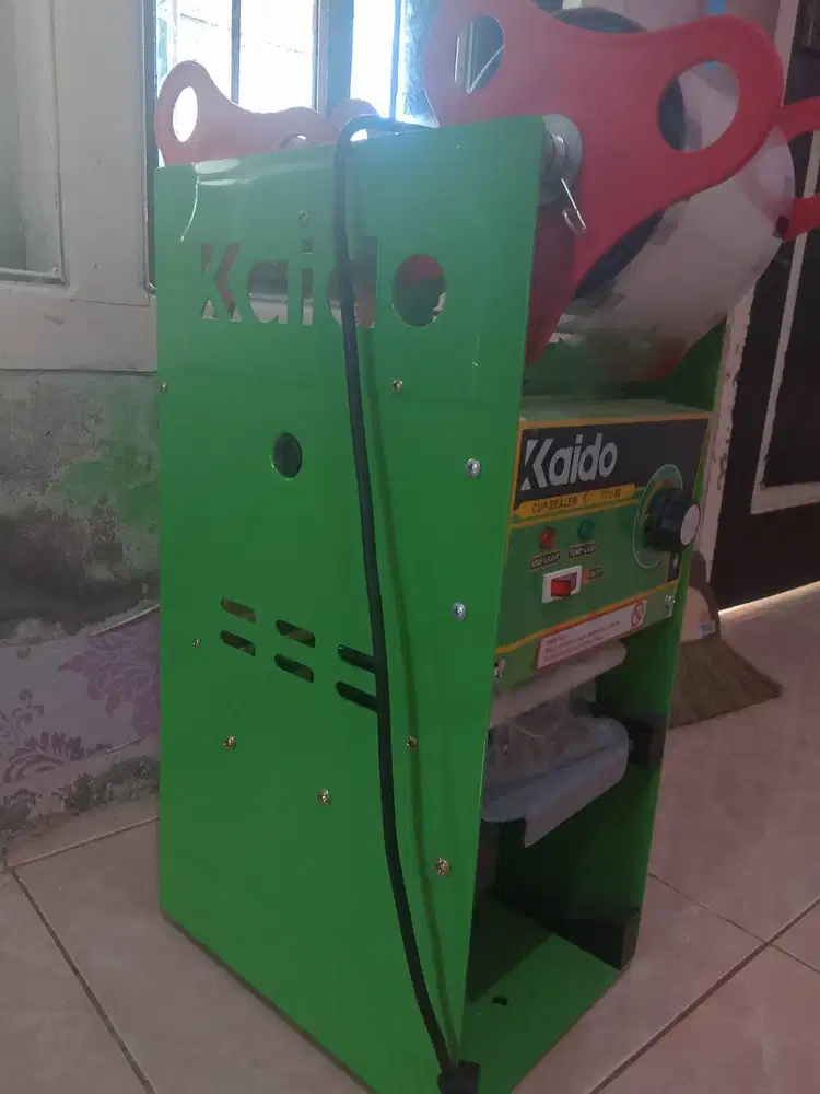 Mesin press cup Sealer