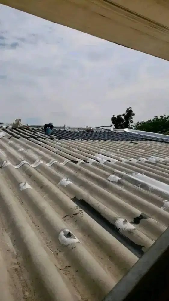 Tukang perbaikan atap bocor dinding dak rembes talang air renovasi DLL