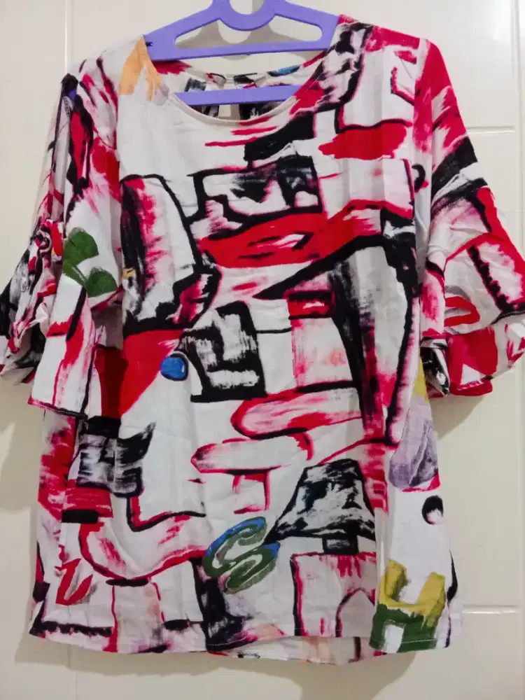 Atasan wanita motif tie die