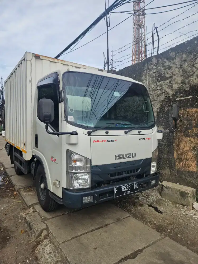 Isuzu giga 110 ps engkel 4 roda bok besi tahun 2021