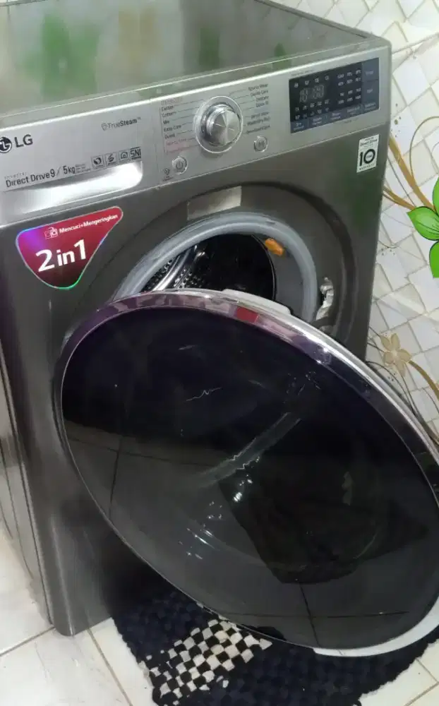 Mesin Cuci Frontloading LG 9/5kg driyer 100% kering jual cepat Bu,nego