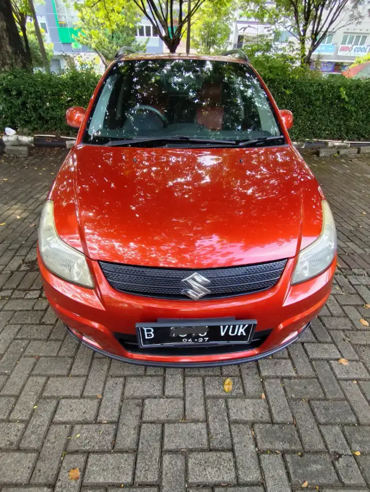 Suzuki SX4 cbu oranye