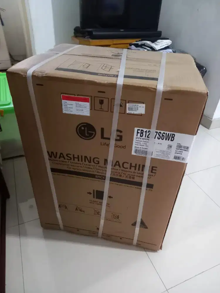 LG WASHING MACHINE FRONT LOADING 7 KG WHITE