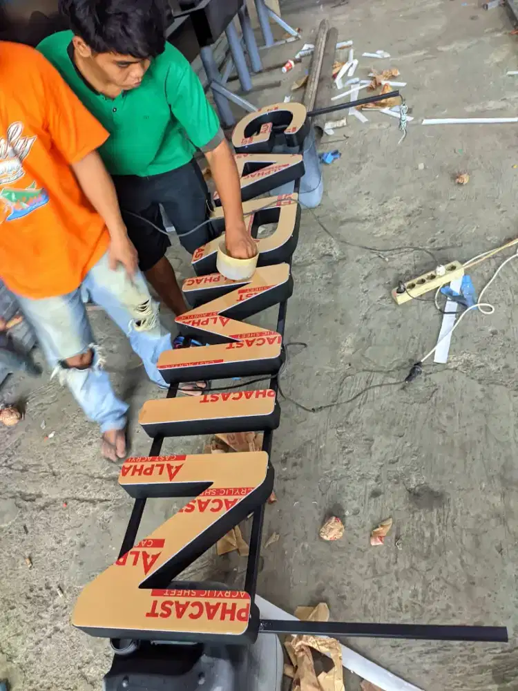 Custome Huruf timbul