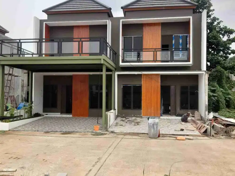 Rumah Townhouse mewah 2 lantai dekat ke pintu tol Jatiwarna,keluar gerbang langsung jalan raya.