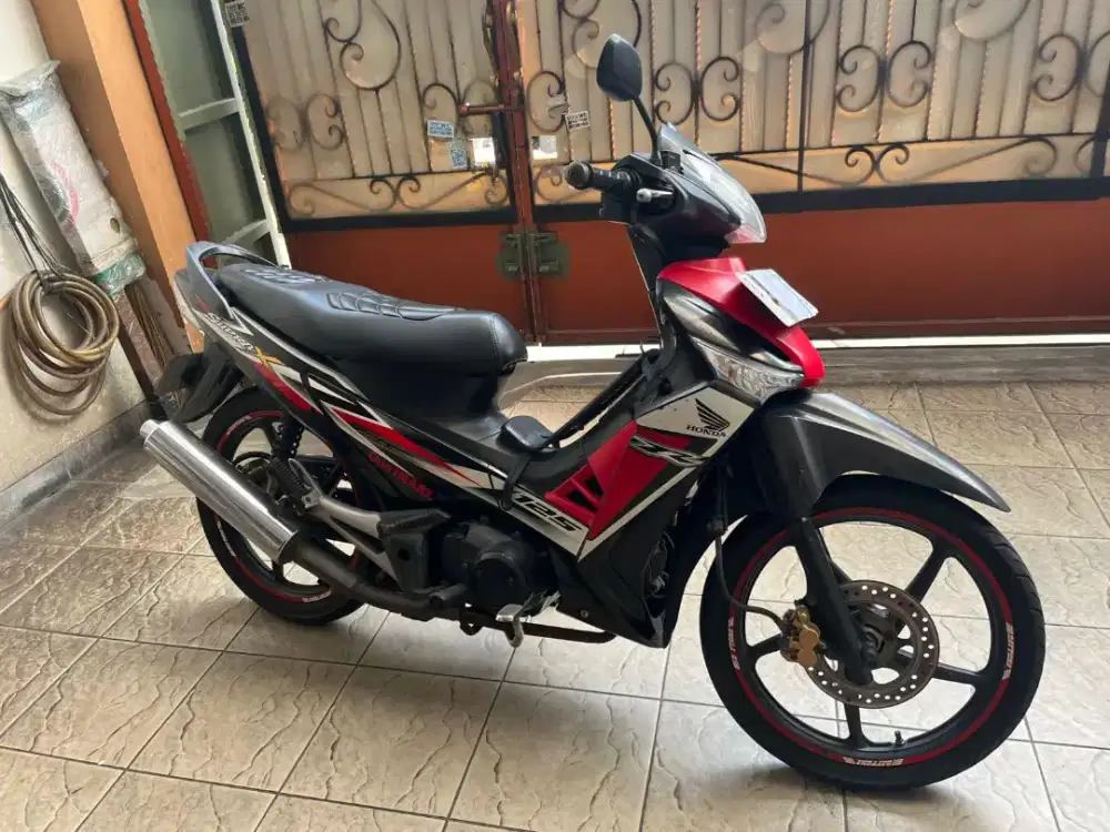 Honda supra x 2013 merah