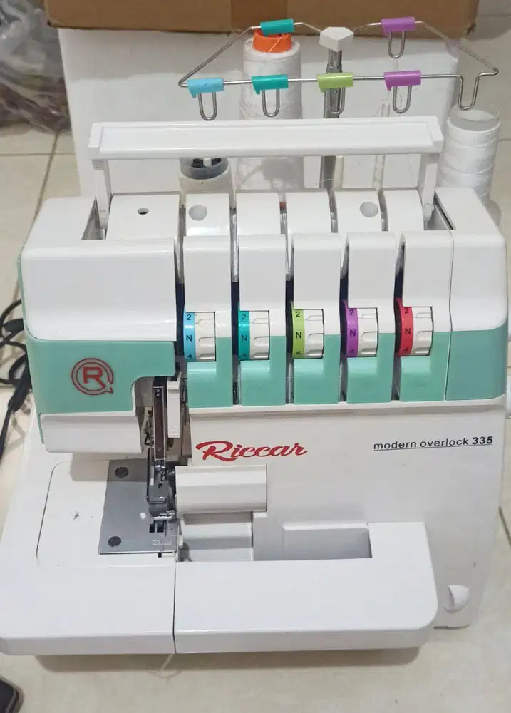 mesin jahit semi obras kancing