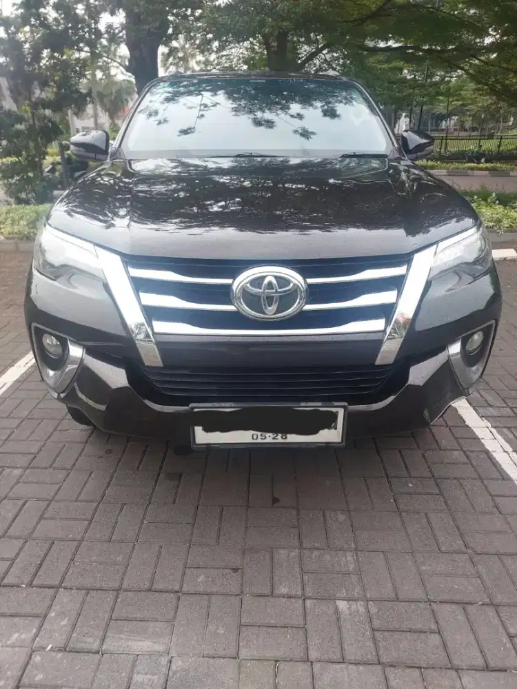 FORTUNER DIESEL COKLAT TUA