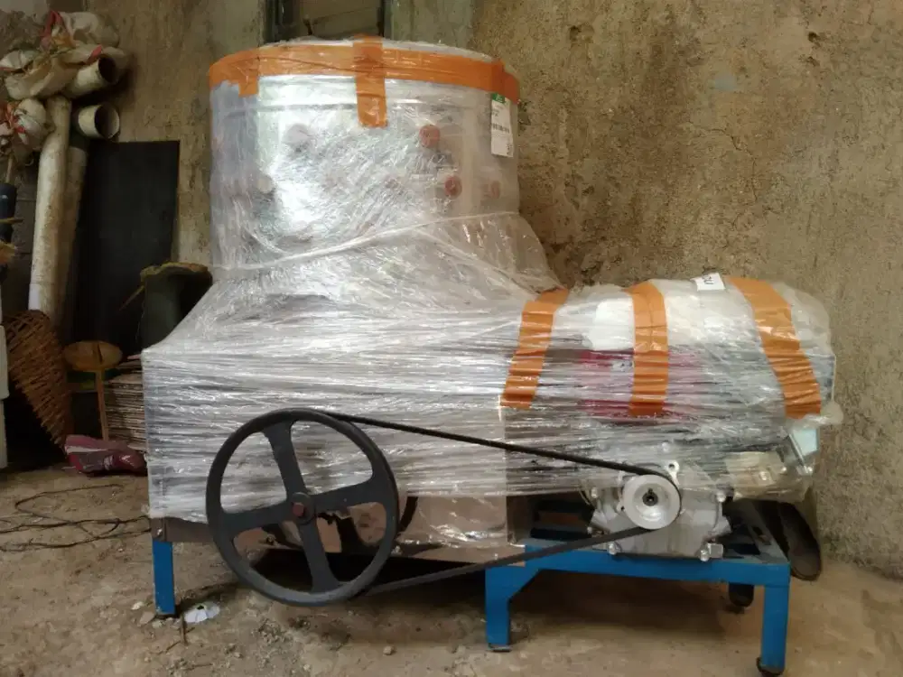 Mesin pencabut bulu ayam