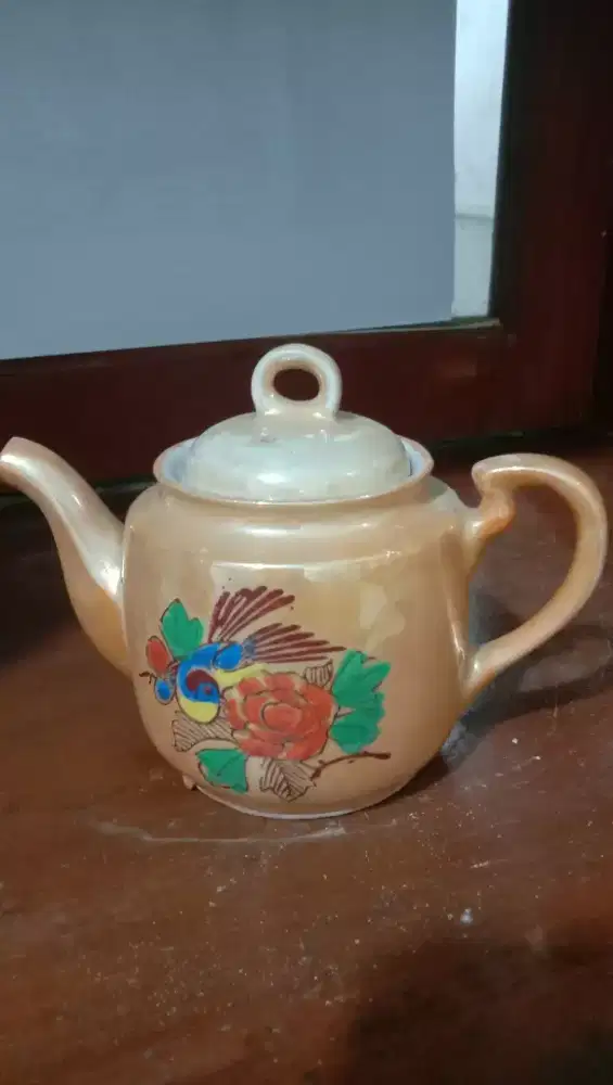 Teko keramik motif bunga