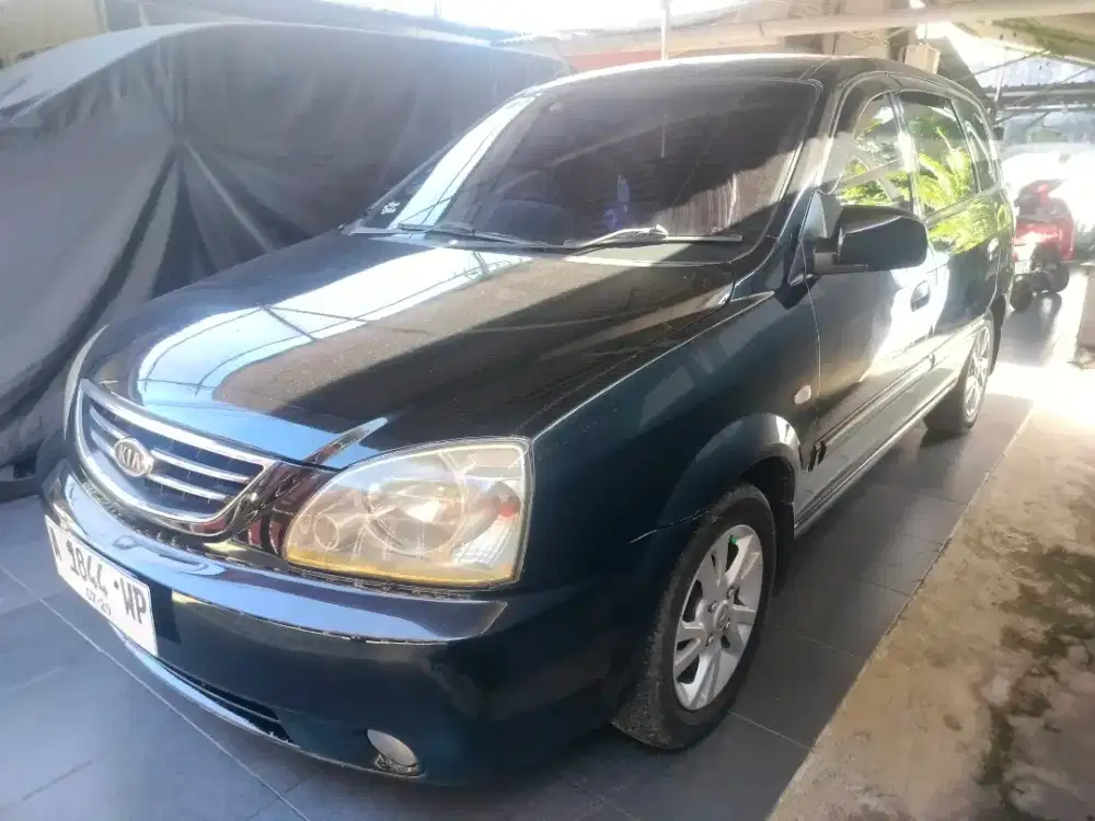 KIA Carens ll manual th2003
