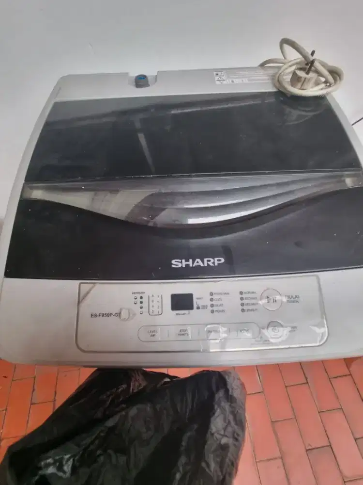 Mesin cuci merck sharp warna putih