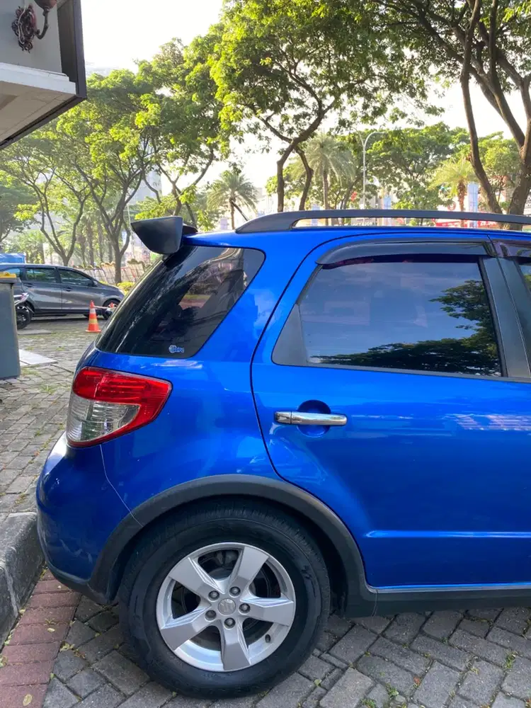 Suzuki SX4 X-Over AT 2010 Biru | HU Android | Jok Kulit | TV headrest
