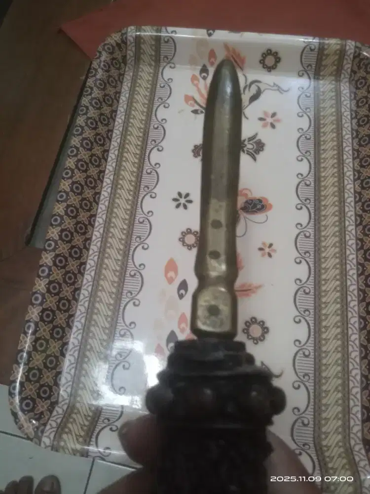 Tombak sepoh besi kuning tindik