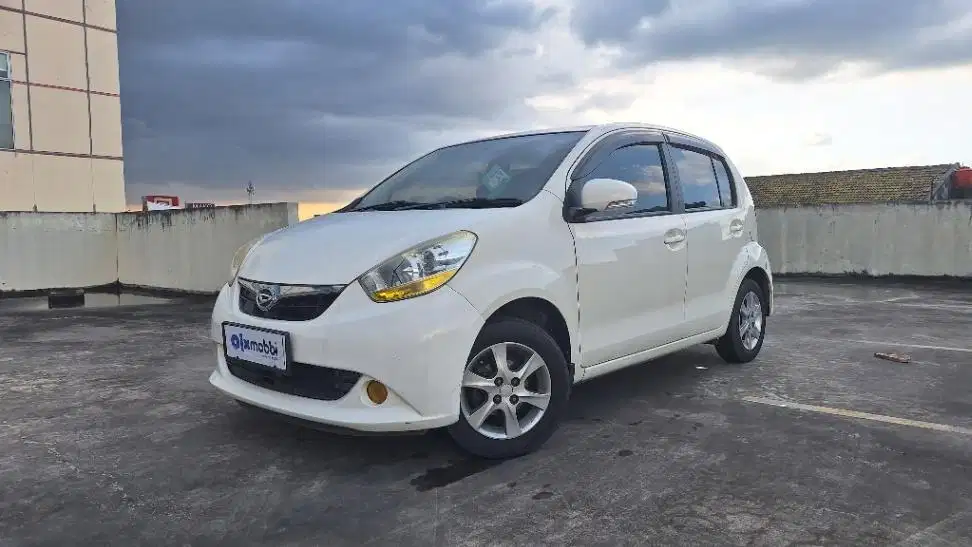 DP MURAH Daihatsu Sirion 1.3 Bensin-AT 2012 Putih