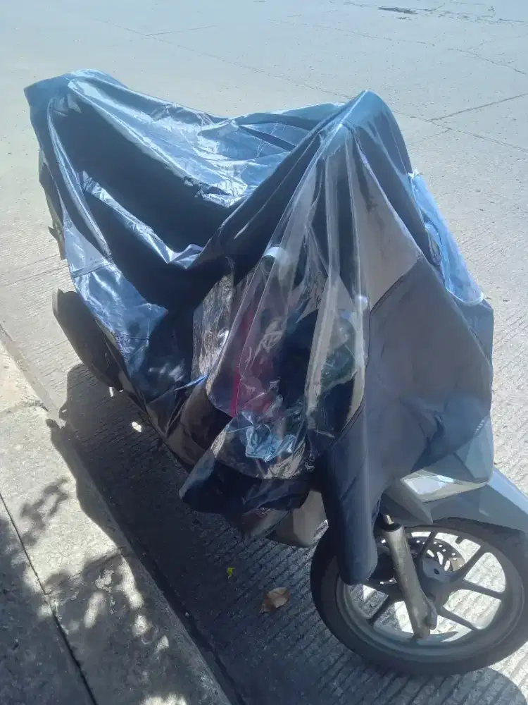 Jas ujan dan tutup mtr