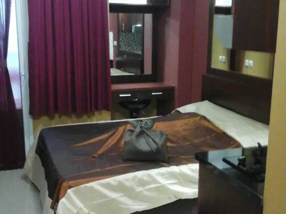 Apartemen the green pramuka city bougenville studio furnish