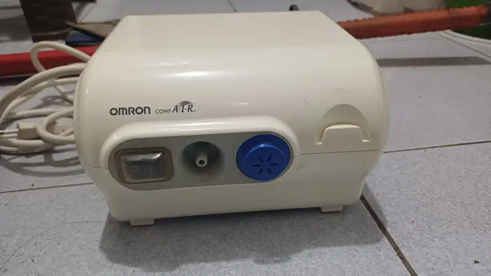 Omron nebulizer alat bantu hirup uap