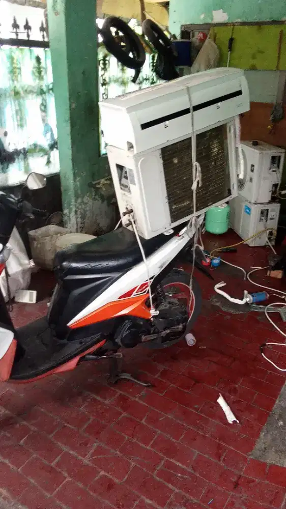 Jasa pindah AC bongkar pasang service AC service kulkas bergaransi