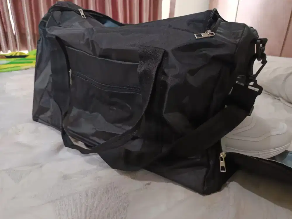 Tas Travel dan Gim Anti Air