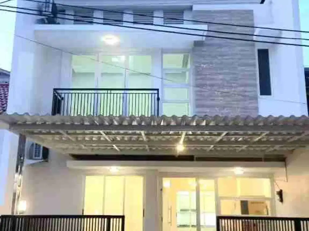 Jual Rumah Baru Semi Furnish Pakuwon City dibangun dengan bata merah