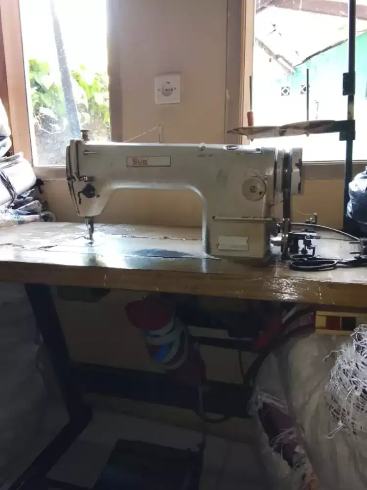 Mesin jahit merk sunstart