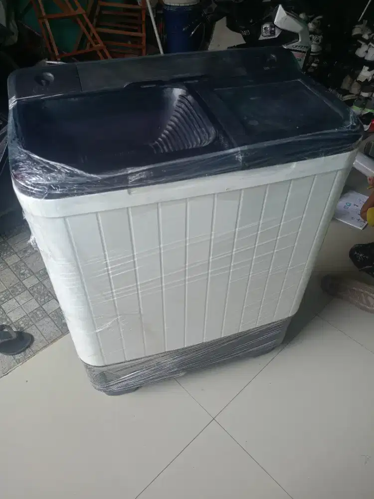 Mesin cuci 2 tabung merk denpo muluss yg ad  buat penggilesannya