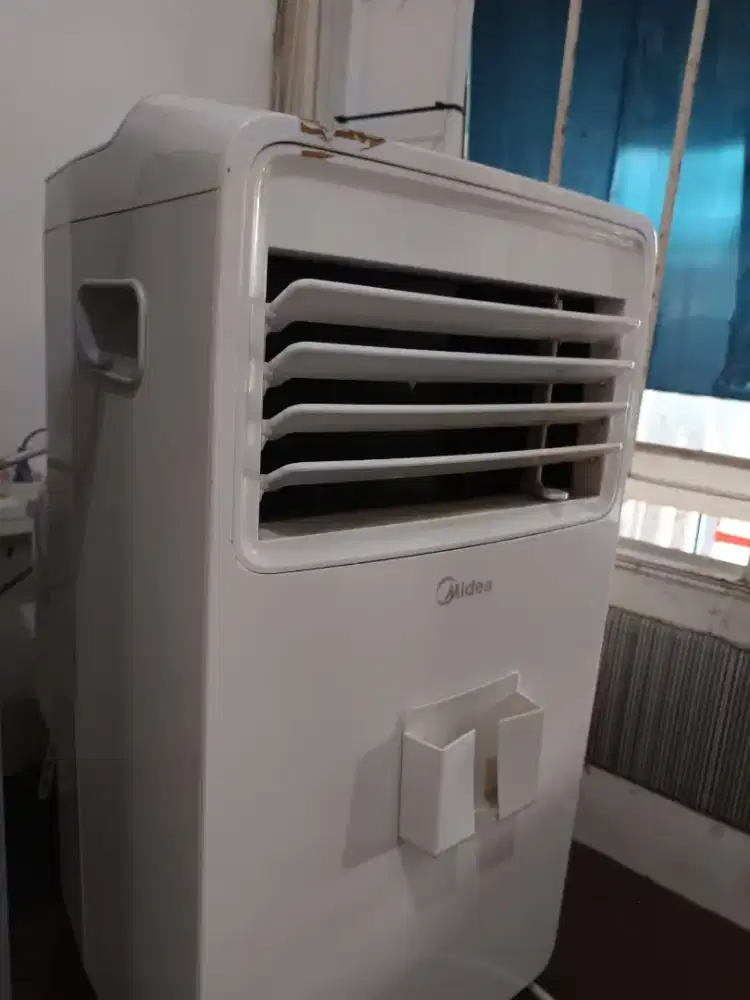 AC Portable  1/2 PK 1,8 juta