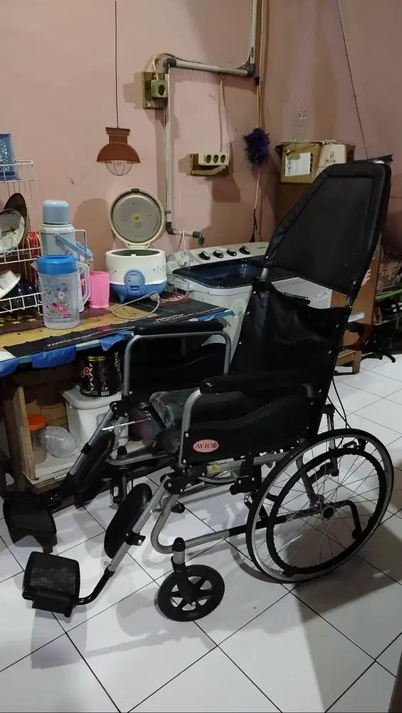 kursi roda senderan atas